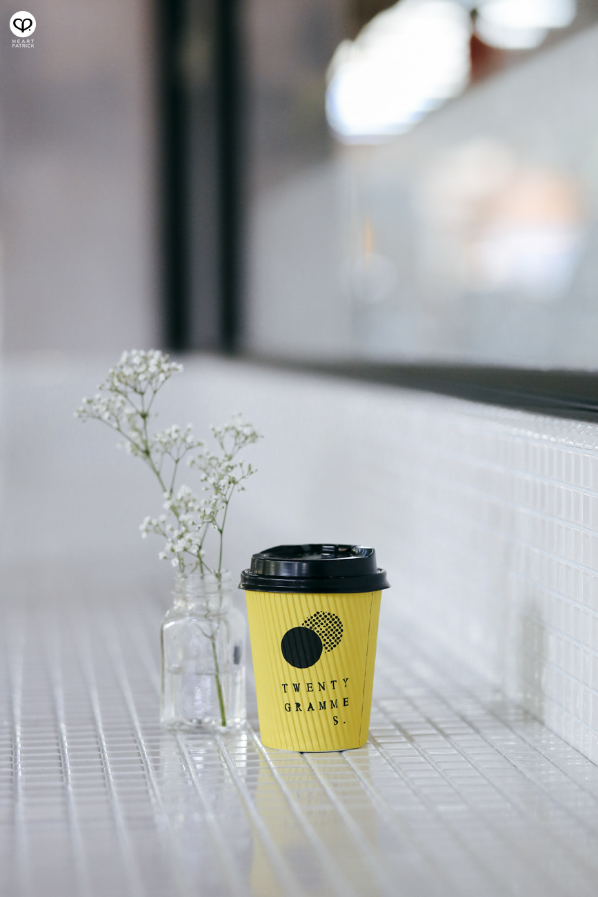 heartpatrick singapore café cafehopping ang mo kio interior design industrial space yellow coffee takeaway cup