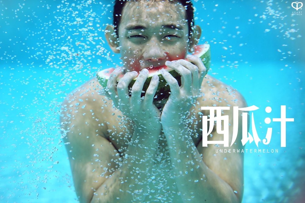heartpatrick underwater male portrait watermelon conceptual